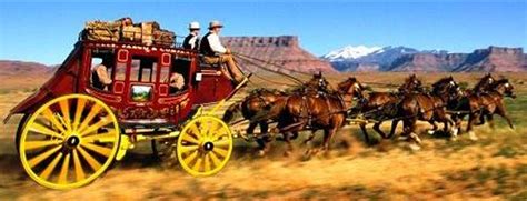 wells fargo stagecoach with horses.